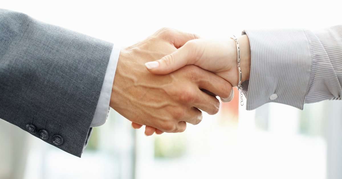 Hand-shake-on-contract Hand shake on contract